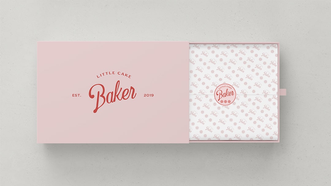 Box and tissue design for Little Cake Baker Brittany Lombardi by Stellen Design branding agency and Logo design firm in Los Angeles California