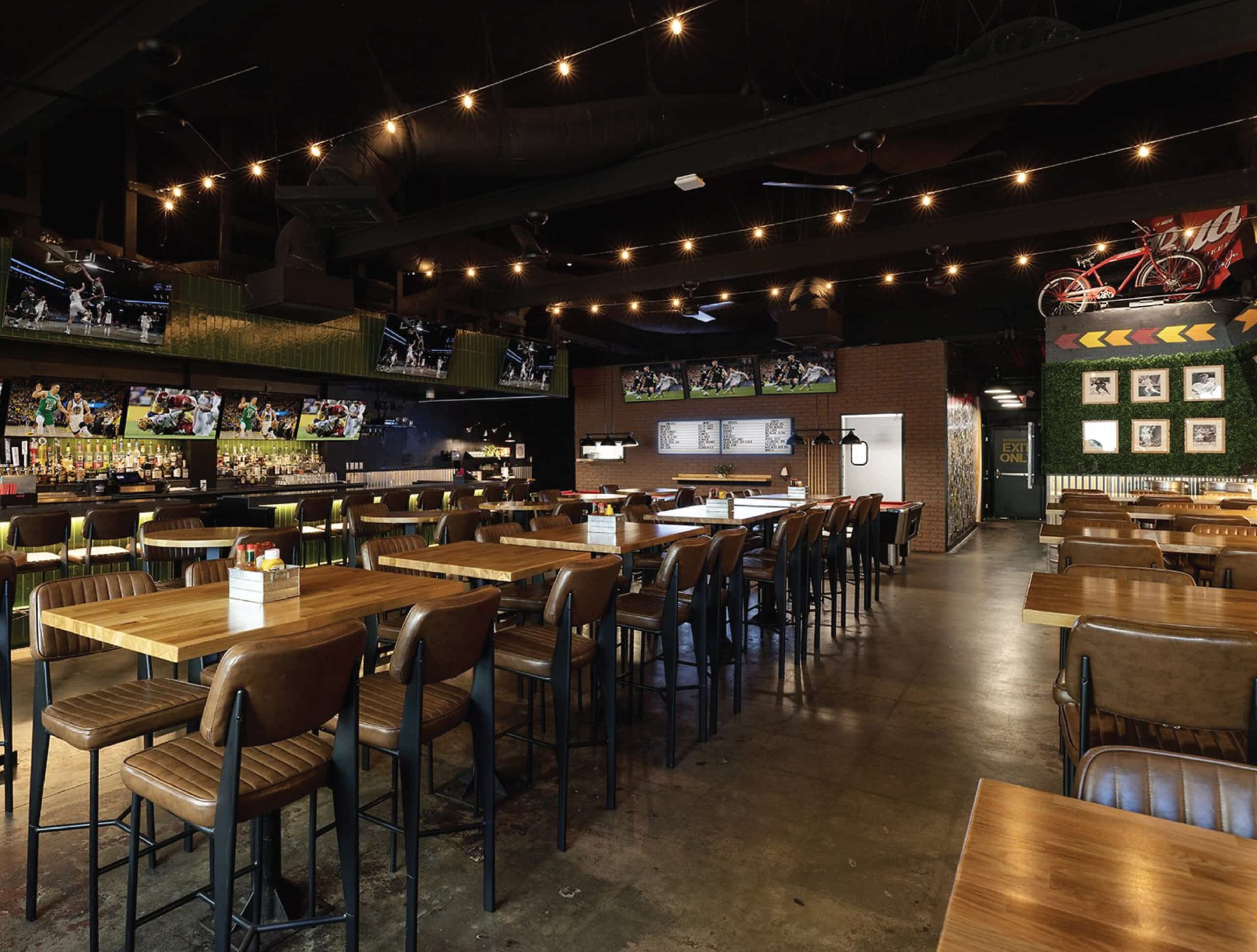 Interior of Maxs Sports grill in Huntington Beach by Sage Gracie with the branding support of Stellen Design brand identity design