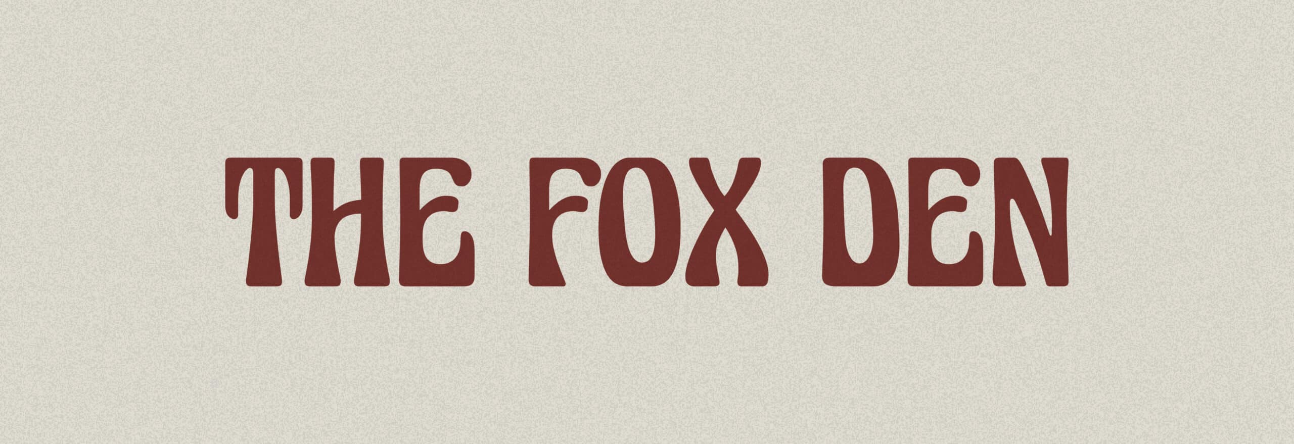 The Fox Den logo, a key element of the bar's branding, showcasing a stylish fox silhouette and retro typography for this popular Redondo Beach cocktail destination.